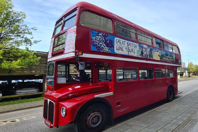 Routemaster bus parked outside Leonardo Hotel ready to start the Great British Wine Tour